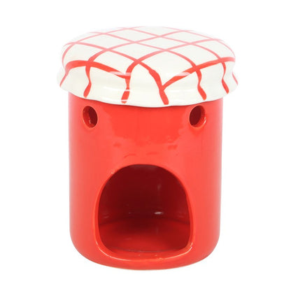 Indulge in a classic designed oil burner and wax warmer carefully curated by The Original Candle Company in the shape and style of a strawberry jam oil burner and wax warmer. This image shows the detail where your tealight candle would go.