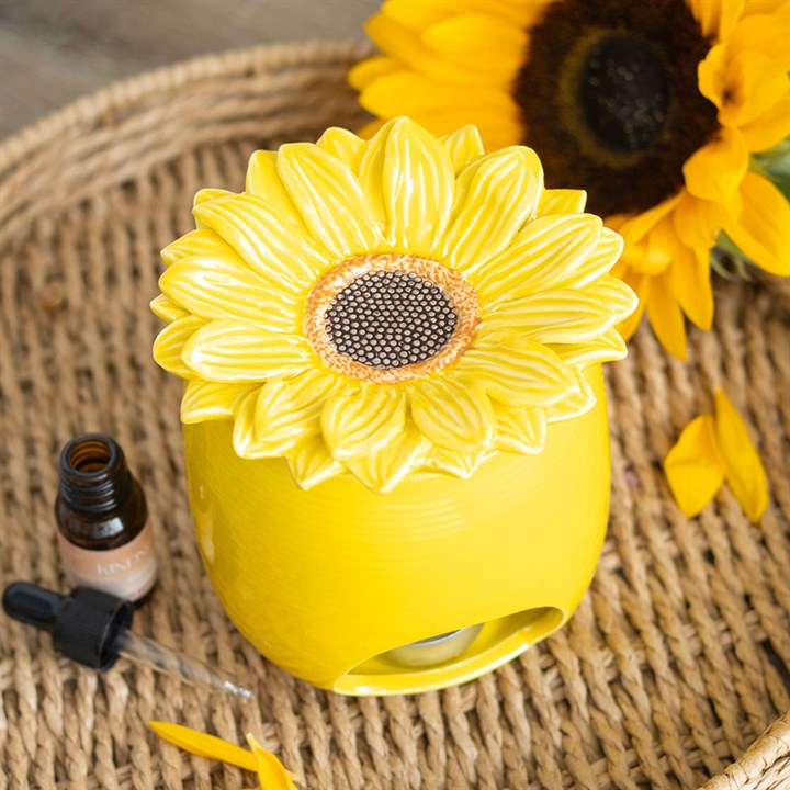 Carefully selected by The Original Candle Company this sunflower themed oil burner and wax warmer will add a touch of brightness to any room. Featuring a classic sunflower designed wax well and vibrant yellow body this oil burner and wax warmer is perfect for any room to add a touch of brightness.