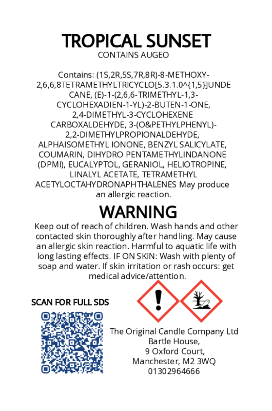 Product label for 'Tropical Sunset' candle with ingredients list, warning, and contact information.