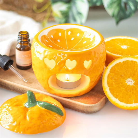 Add some orange zest to your space with this vibrant orange shaped oil burner and wax warmer, specially selected by The Original Candle Company. Featuring a removable lid to reveal the oil and wax well, this stunning design is sure to be a feature in any room.