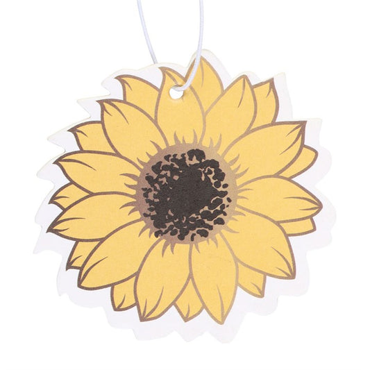 A warm honey fragranced car air freshener in a yellow sunflower design.
