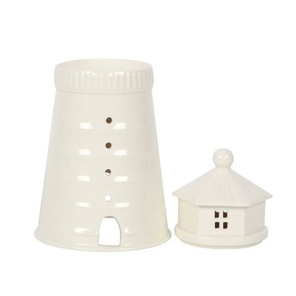Add a nautical touch to any room with this stunning while lighthouse design oil burner and wax warmer. With a removable lid to reveal the oil and wax well.