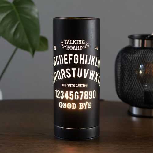 Striking black aroma touch lamp featuring a mystical talking board design that illuminates during use. It blends potent aromatherapy with an enchanting glow to set the perfect mood—crafted for The Original Candle Co.