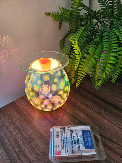 COMFY DRESSING GOWN Wax Melts from The Original Candle Co., blending the invigorating scent of freshly laundered fabric with hints of lemon, apple, lavender, and lily. A handcrafted wax melt designed to bring warmth and freshness to your space.
