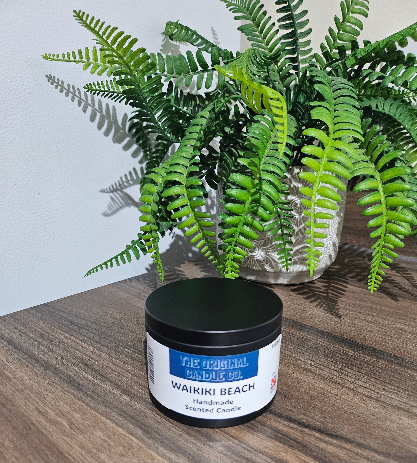 Waikiki scented candle infused with exotic coconut, ripe dragon fruit, and fresh saltwater breeze, creating a vibrant and tropical fragrance experience.